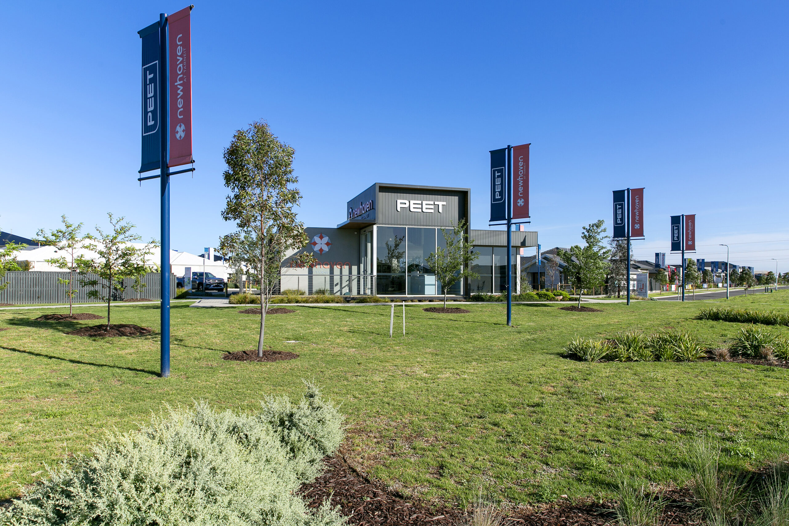 Landscaped community entrance with modern signage and green open spaces in Tarneit, Melbourne