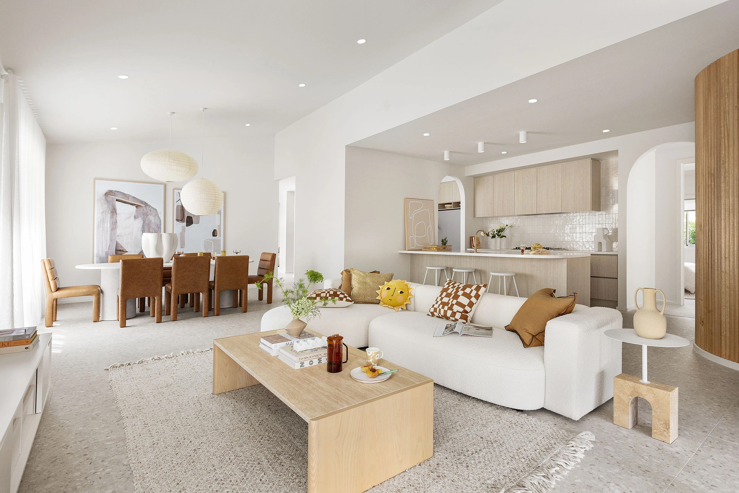 Open-plan kitchen, dining and living area in a Melbourne display home